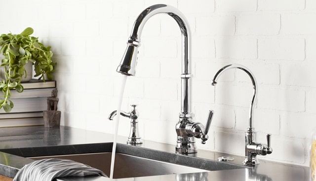 chrome Moen Paterson kitchen faucets installed