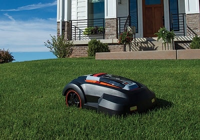 redback robot lawn mower rm24a in yard