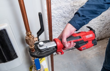 Ridgid RP 115 Mini press tool in a action, connecting water heater lines